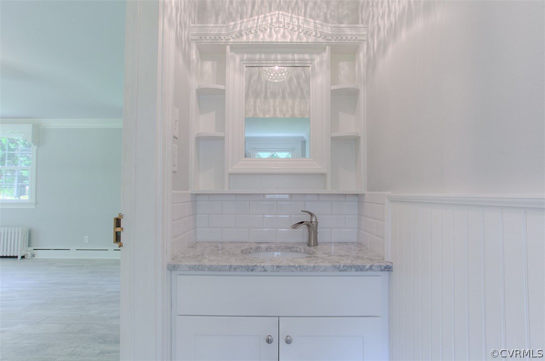 7110 Cherokee Road Richmond, VA 23225 - Photo 22 of 47 Half bath attached to family room with tile floor,