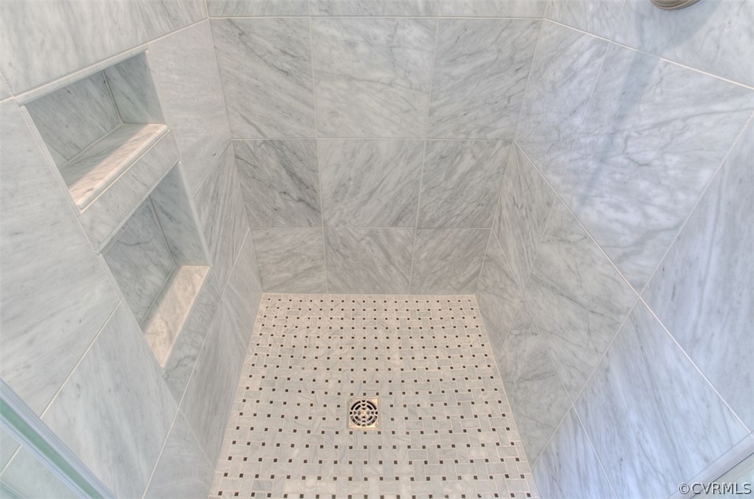 7110 Cherokee Road Richmond, VA 23225 - Photo 28 of 47 Marble shower with recessed shelves