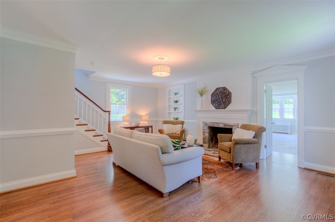 7110 Cherokee Road Richmond, VA 23225 - Photo 4 of 47 Living Room with wood burning fireplace, refinishe