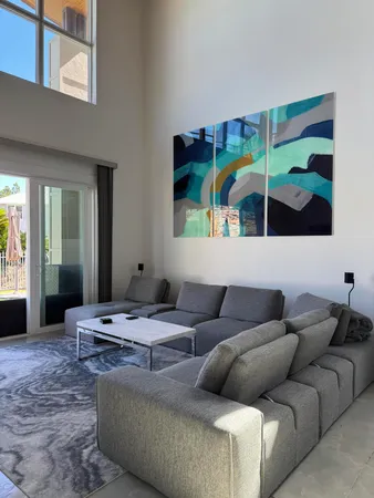 a living room with furniture and a couch