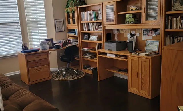 a kitchen with a sink a stove and a table