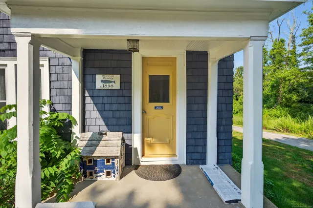 a view of entrance door of a house