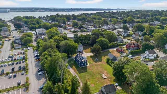 an aerial view of a city with lots of residential buildings
