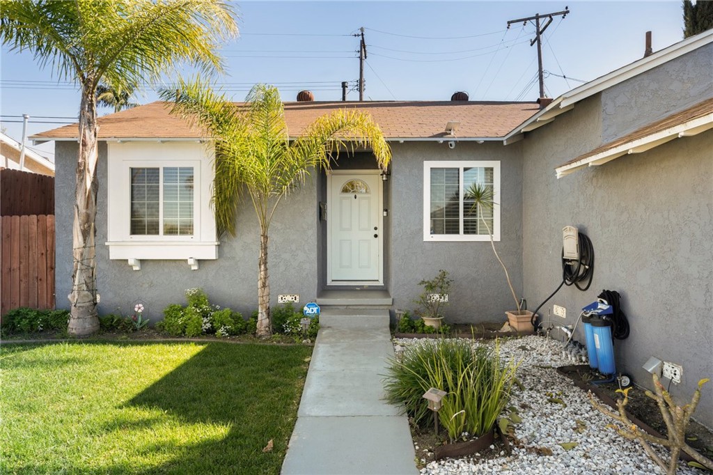 15326 Leffingwell Road Whittier, CA 90604 - Photo 3 of 20 a front view of a house with garden