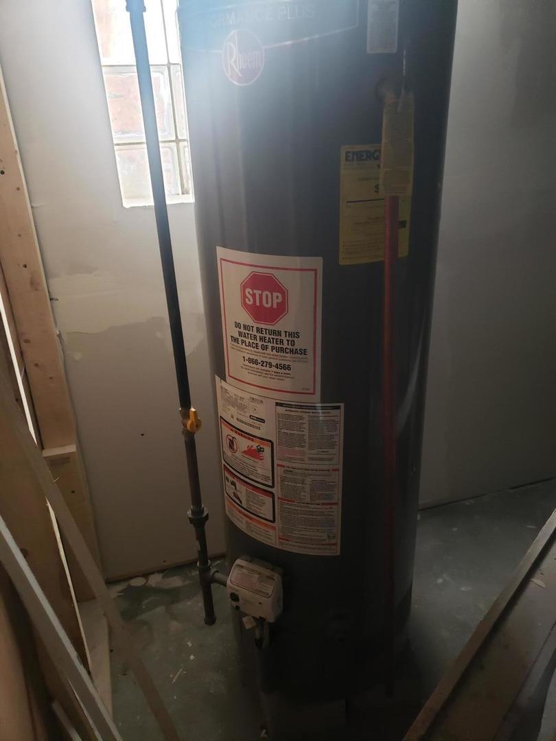 1040 West 92nd Place Chicago, IL 60620 - Photo 26 of 29 a view of water heater room