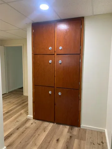 a view of a livingroom with wooden floor