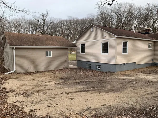 a view of backyard of house