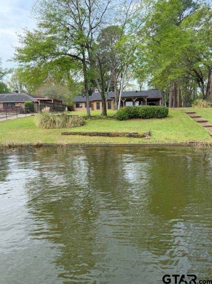 a view of building with trees in the background