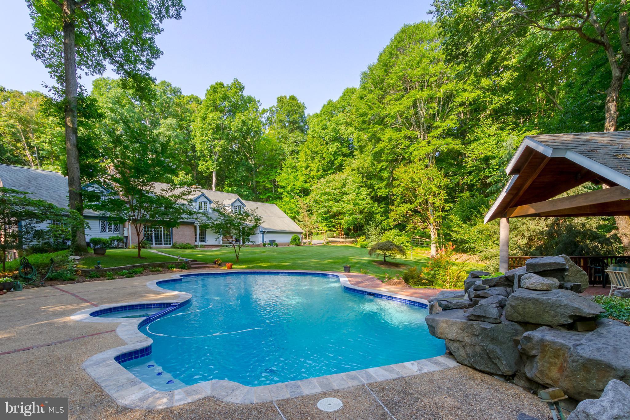 7814 Willowbrook Road Fairfax Station, VA 22039 - Photo 28 of 30 Fabulous Salt Water Pool with waterfall