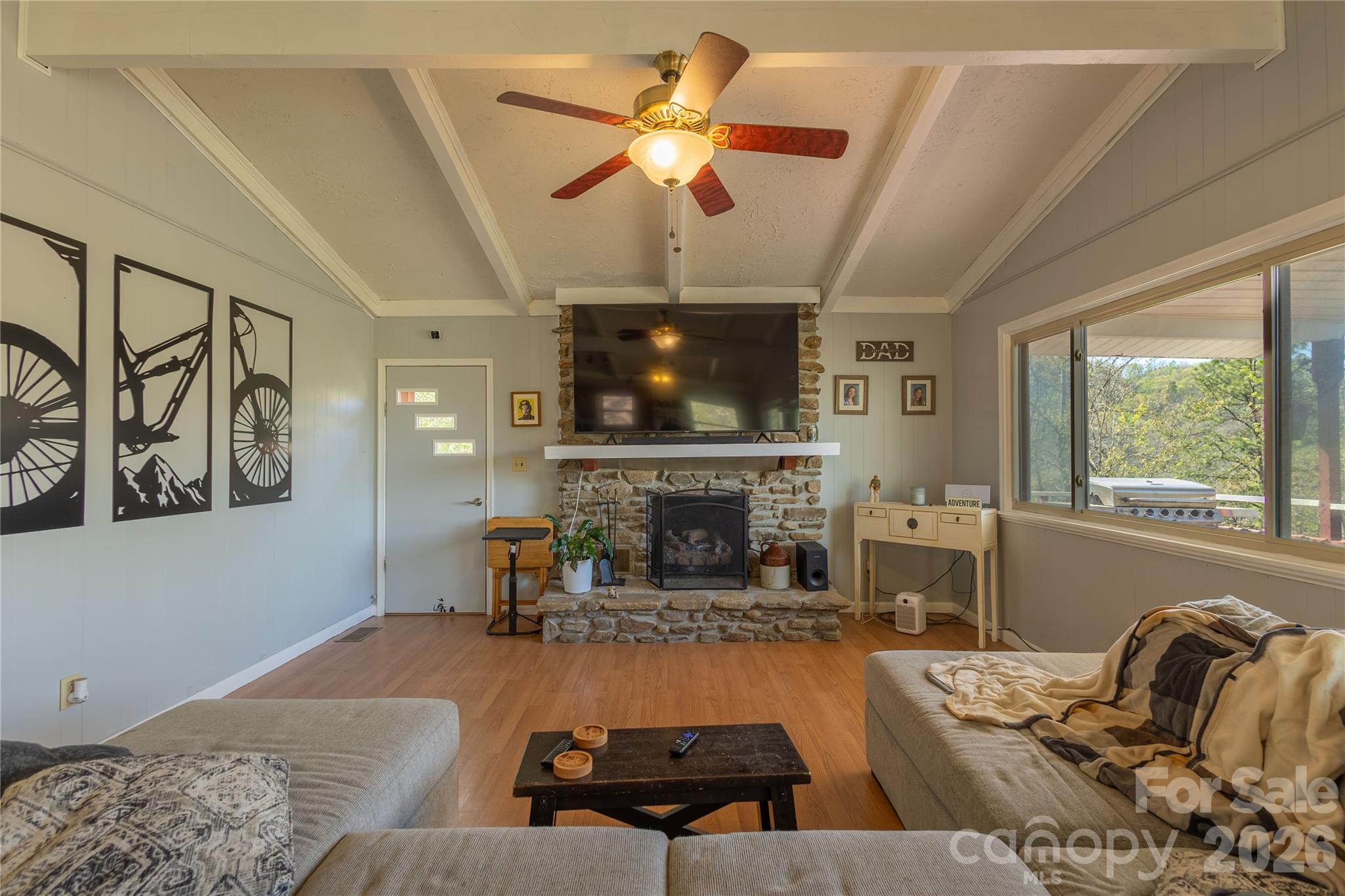 344 Pine Ridge Trail Almond, NC 28702 - Photo 15 of 36 a living room with furniture and a fireplace