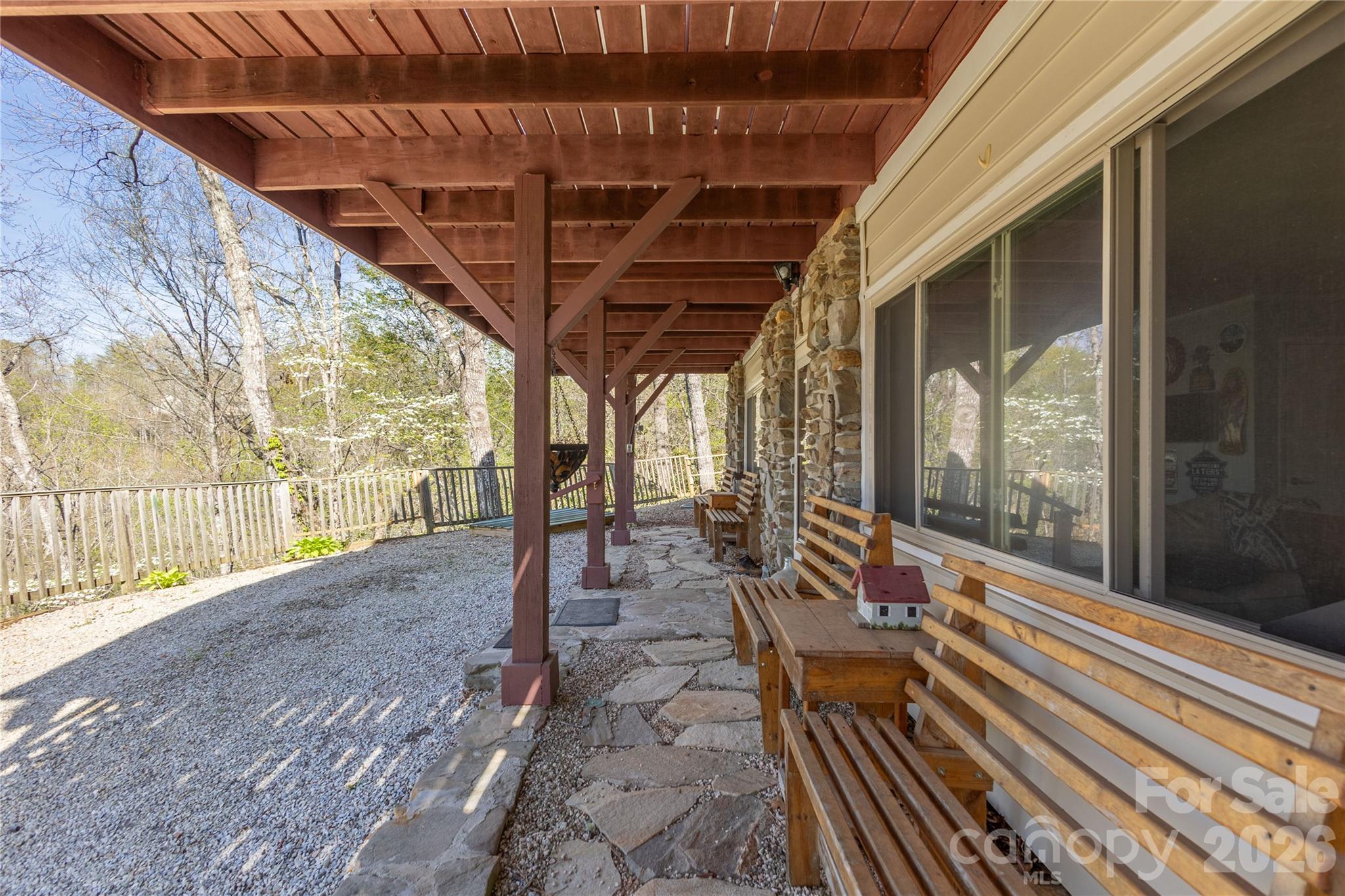 344 Pine Ridge Trail Almond, NC 28702 - Photo 27 of 36 a view of a patio with wooden floor