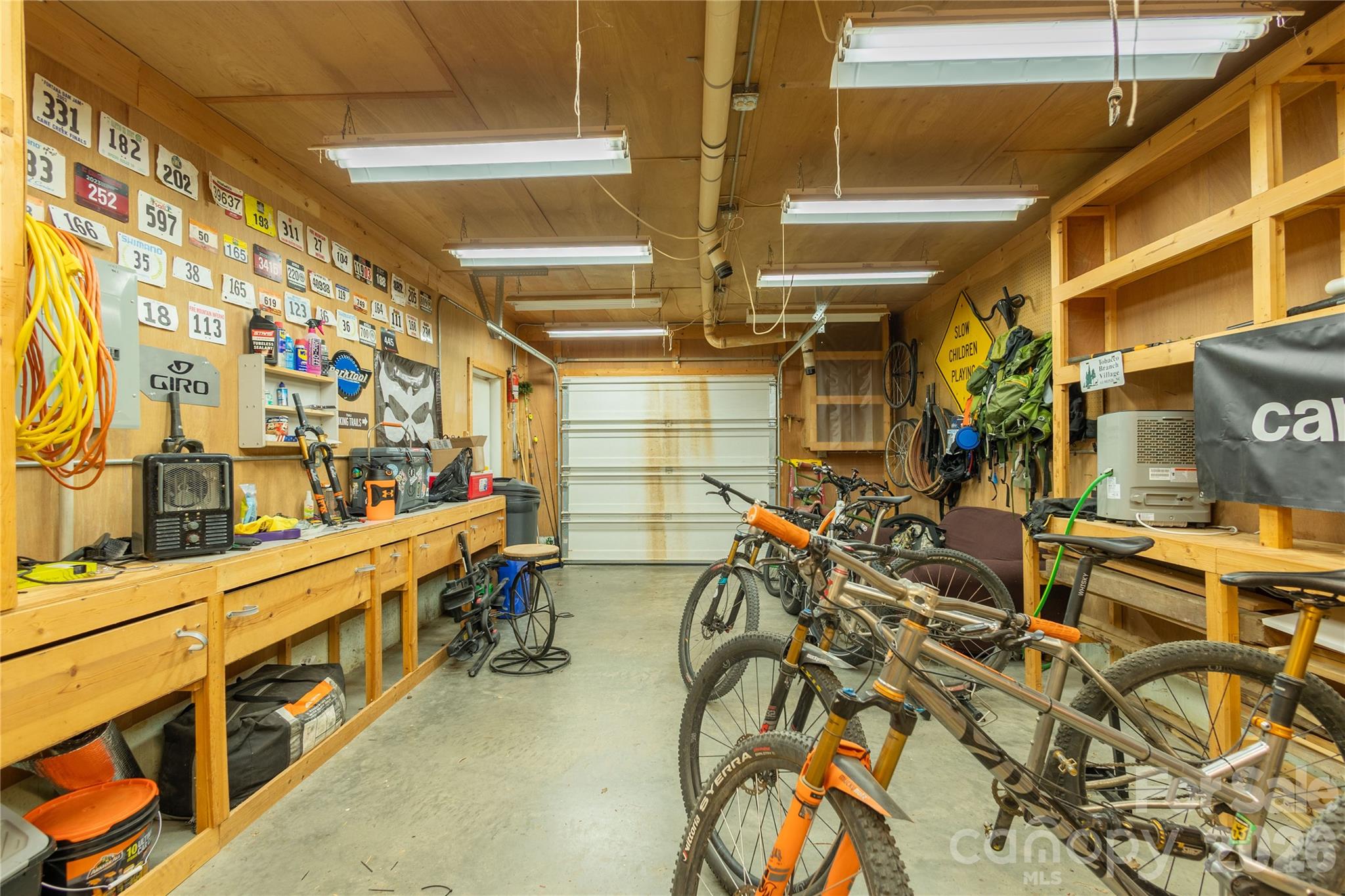 344 Pine Ridge Trail Almond, NC 28702 - Photo 30 of 36 a storage room with bicycles
