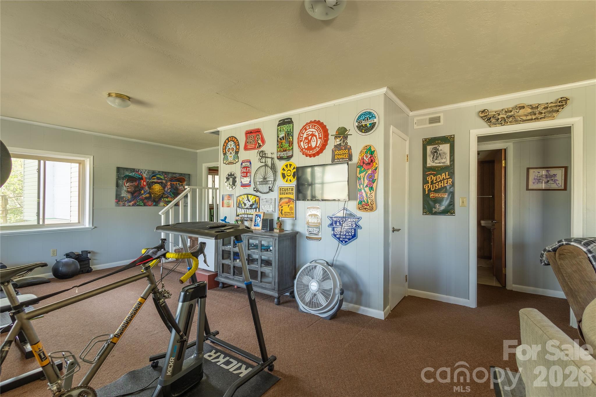 344 Pine Ridge Trail Almond, NC 28702 - Photo 7 of 36 a view of a room with gym equipment