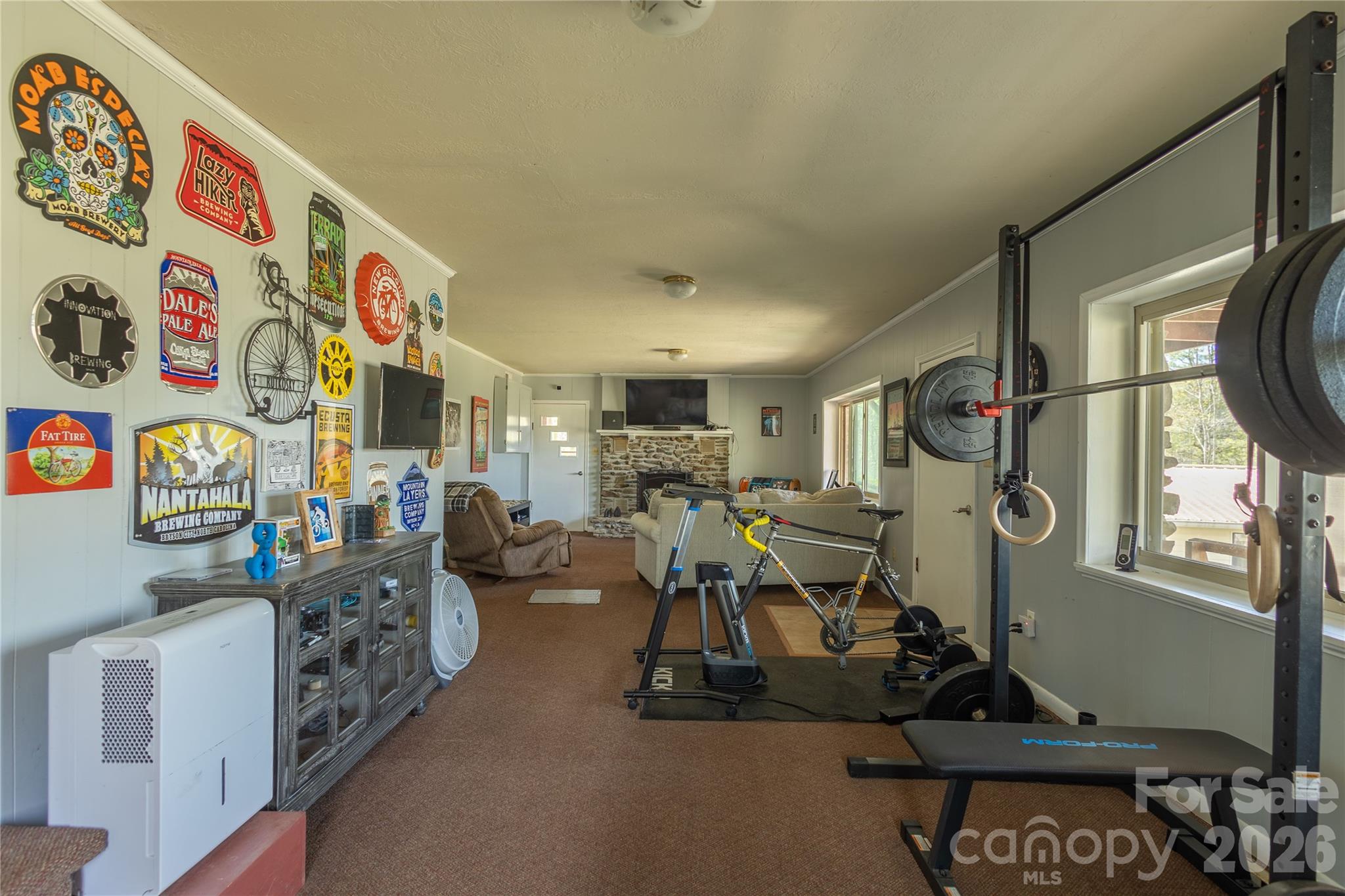 344 Pine Ridge Trail Almond, NC 28702 - Photo 8 of 36 a view of a room with gym equipment