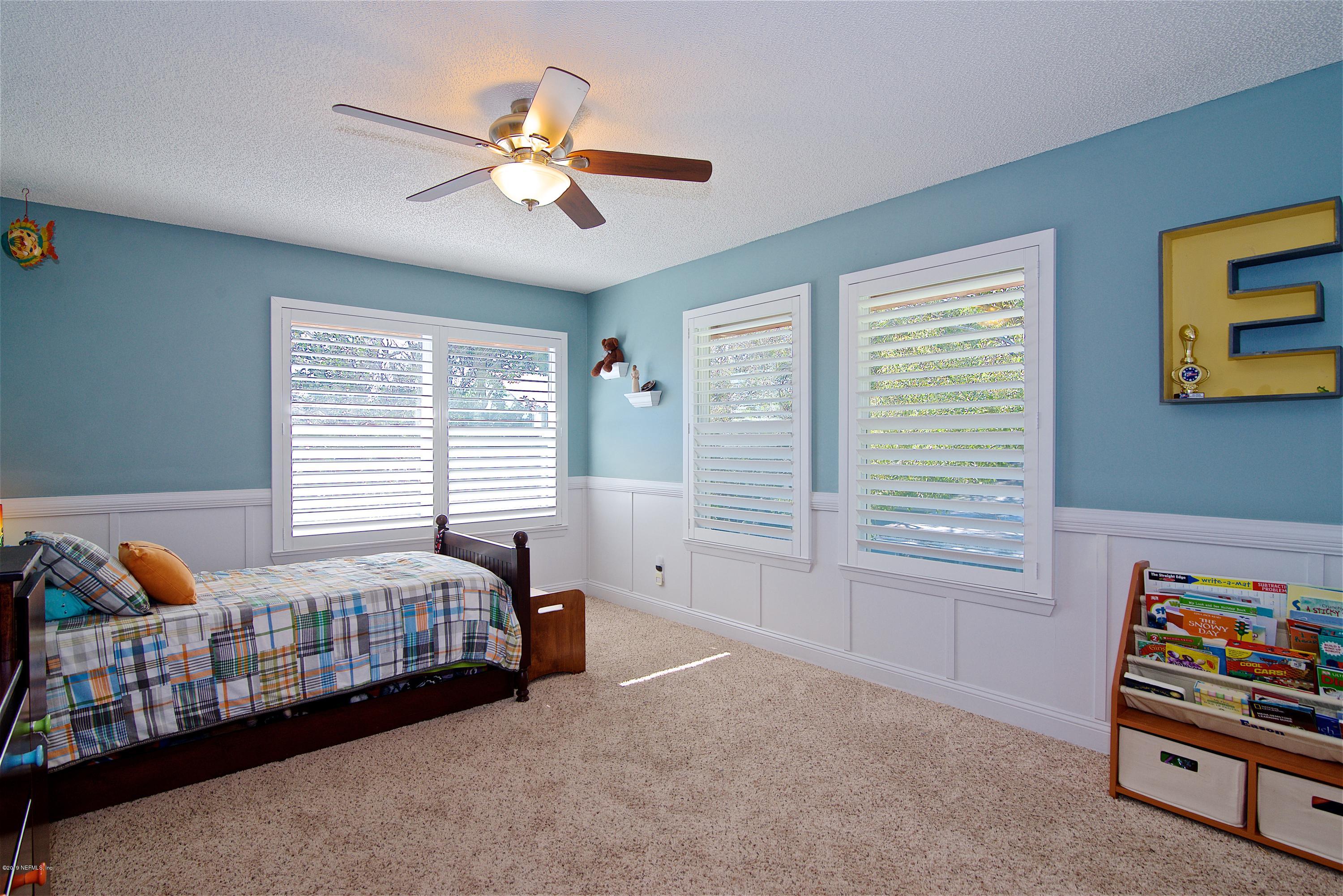 1830 Seminole Road Atlantic Beach, FL 32233 - Photo 36 of 50 a bedroom with bed and a window