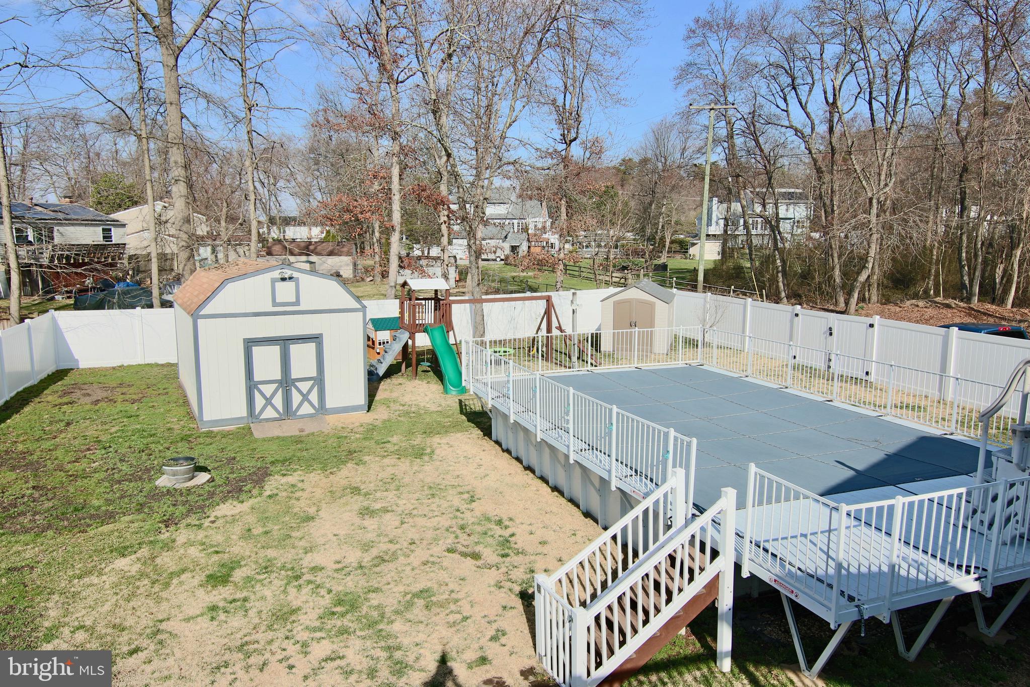 8310 Risha Drive Severn, MD 21144 - Photo 41 of 48 Private Fenced backyard with large pool