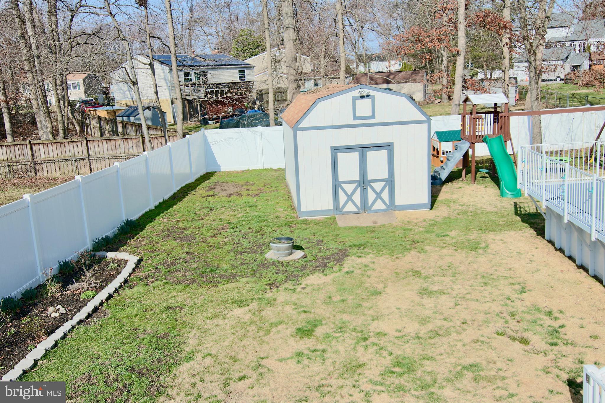 8310 Risha Drive Severn, MD 21144 - Photo 42 of 48 Private Fenced backyard with large shed