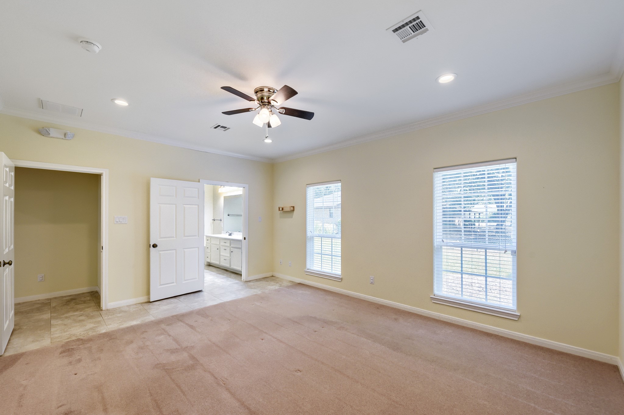 2215 Penick Road Waller, TX 77484 - Photo 18 of 33 Spacious primary bedroom with en-suite primary bathroom
