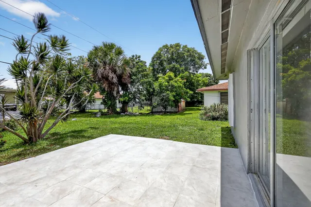 a view of storage and utility room with washer and dryer