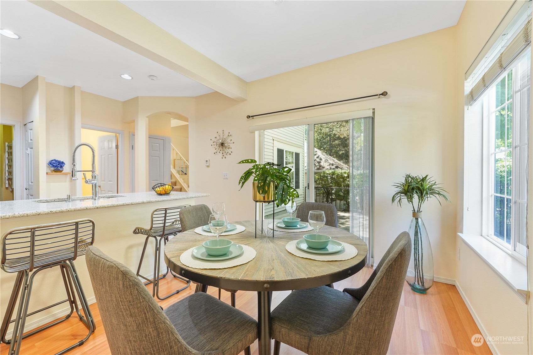 10909 Avondale Road Northeast, Unit K144 Redmond, WA 98052 - Photo 13 of 28 a view of a dining room with furniture and window