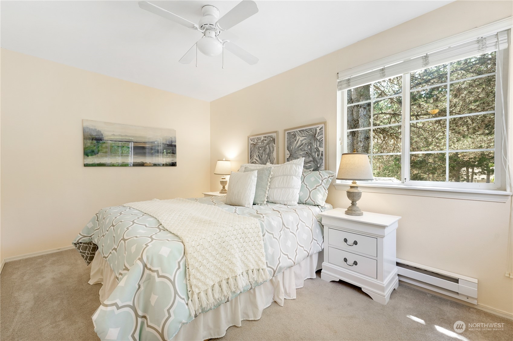 10909 Avondale Road Northeast, Unit K144 Redmond, WA 98052 - Photo 24 of 28 a bedroom with a bed and a window