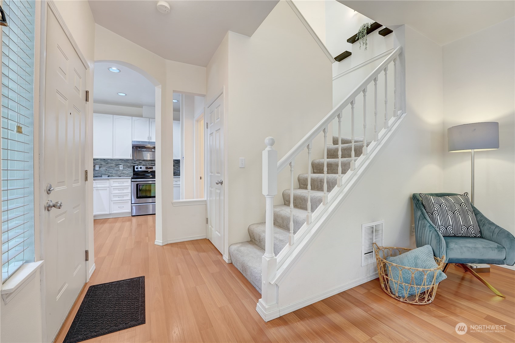 10909 Avondale Road Northeast, Unit K144 Redmond, WA 98052 - Photo 8 of 28 a view of entryway and hall with wooden floor