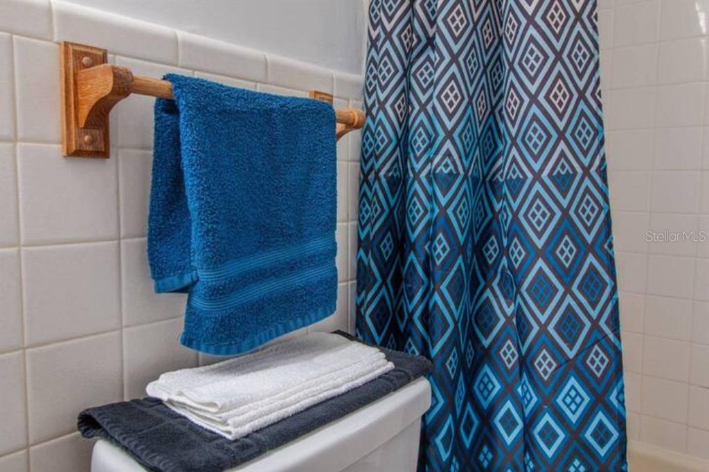 Undisclosed Address Orlando, FL 32806 - Photo 19 of 24 a bathroom with a sink and a mirror