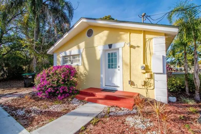 a front view of a house with a porch