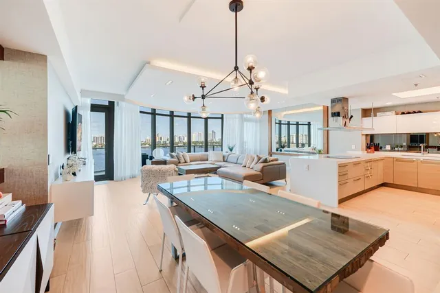 a kitchen with cabinets and white appliances
