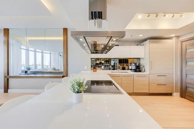 a view of a hallway with seating area