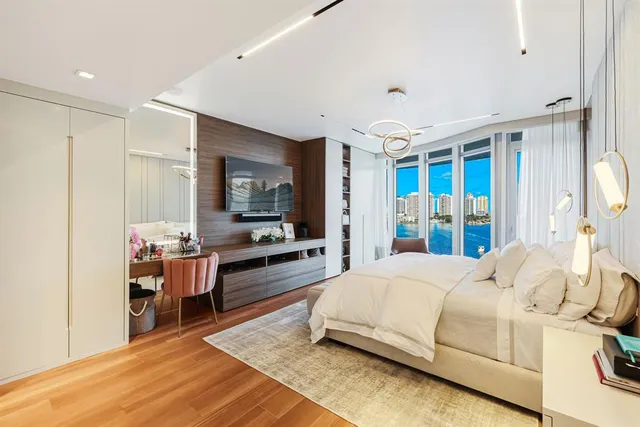 a view of a terrace with couches and city view