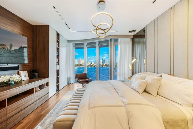 a view of a swimming pool with chairs