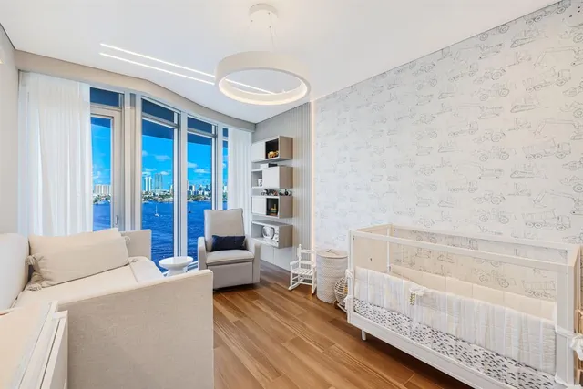 a view of a kitchen with dining table and chairs
