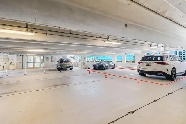 a kitchen with stainless steel appliances a stove a refrigerator and a sink