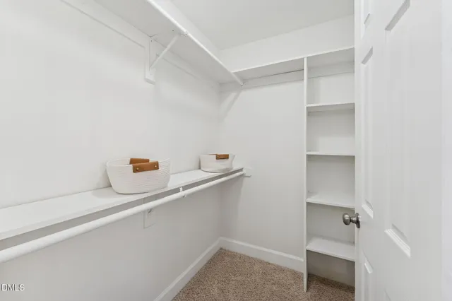 a bathroom with a sink and cabinets