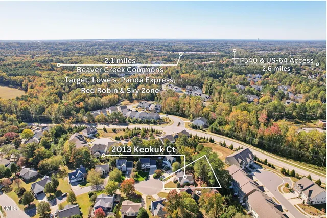 an aerial view of lake and residential houses