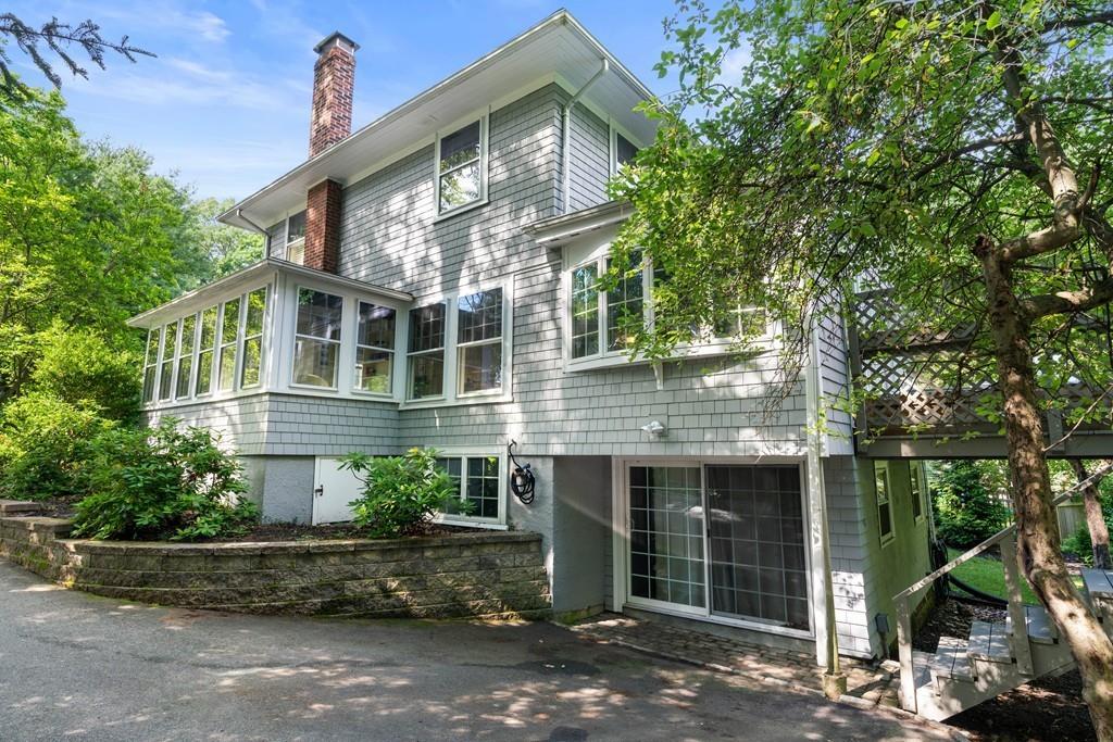 23 Glen Road Wellesley, MA 02481 - Photo 22 of 30 a front view of a house with a garden