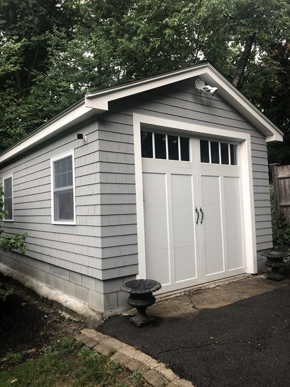 23 Glen Road Wellesley, MA 02481 - Photo 30 of 30 a front view of a house with a yard