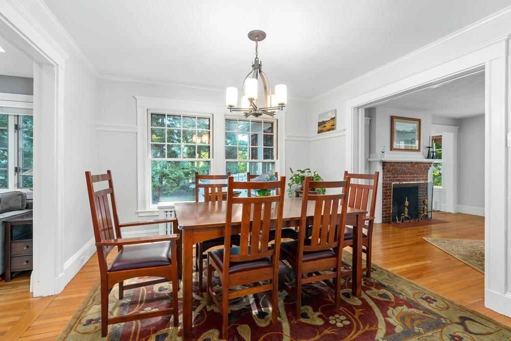 23 Glen Road Wellesley, MA 02481 - Photo 10 of 30 a view of a dining room with furniture window and wooden floor