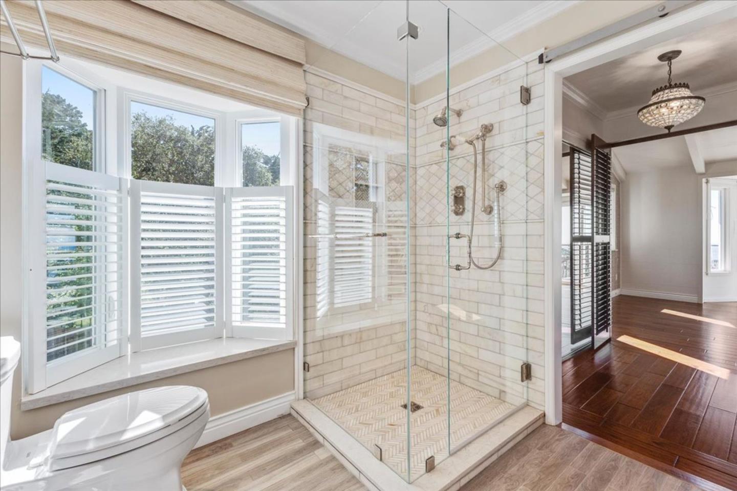 15 Mentone Road Carmel, CA 93923 - Photo 30 of 47 a bathroom with a shower bathtub and sink