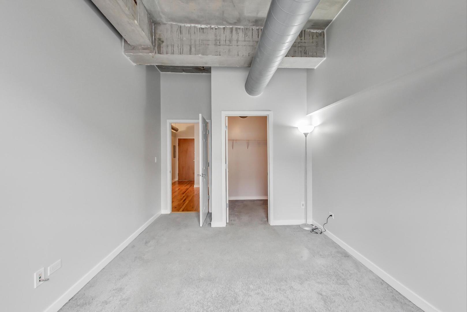 1069 West 14th Place, Unit 310 Chicago, IL 60608 - Photo 12 of 25 a view of an empty room