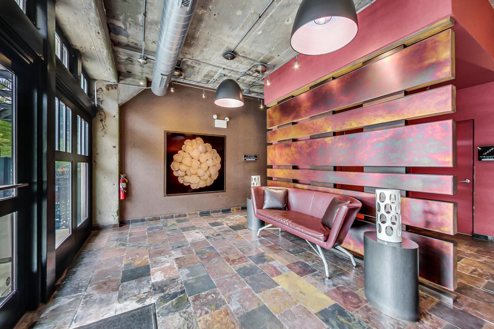 1069 West 14th Place, Unit 310 Chicago, IL 60608 - Photo 2 of 25 a view of an chairs
