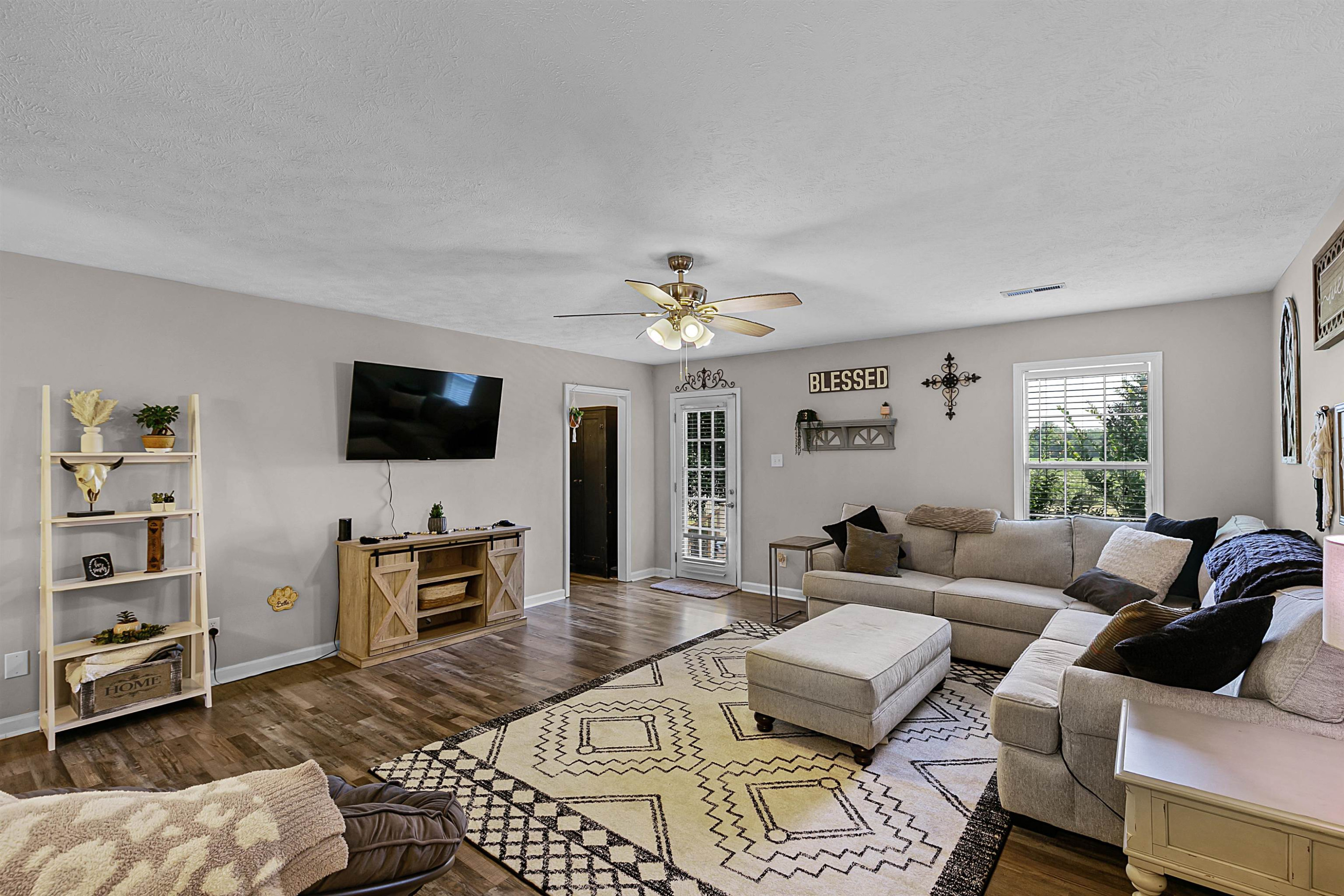 686 Gobelet Road Medon, TN 38356 - Photo 4 of 14 a living room with furniture and a flat screen tv