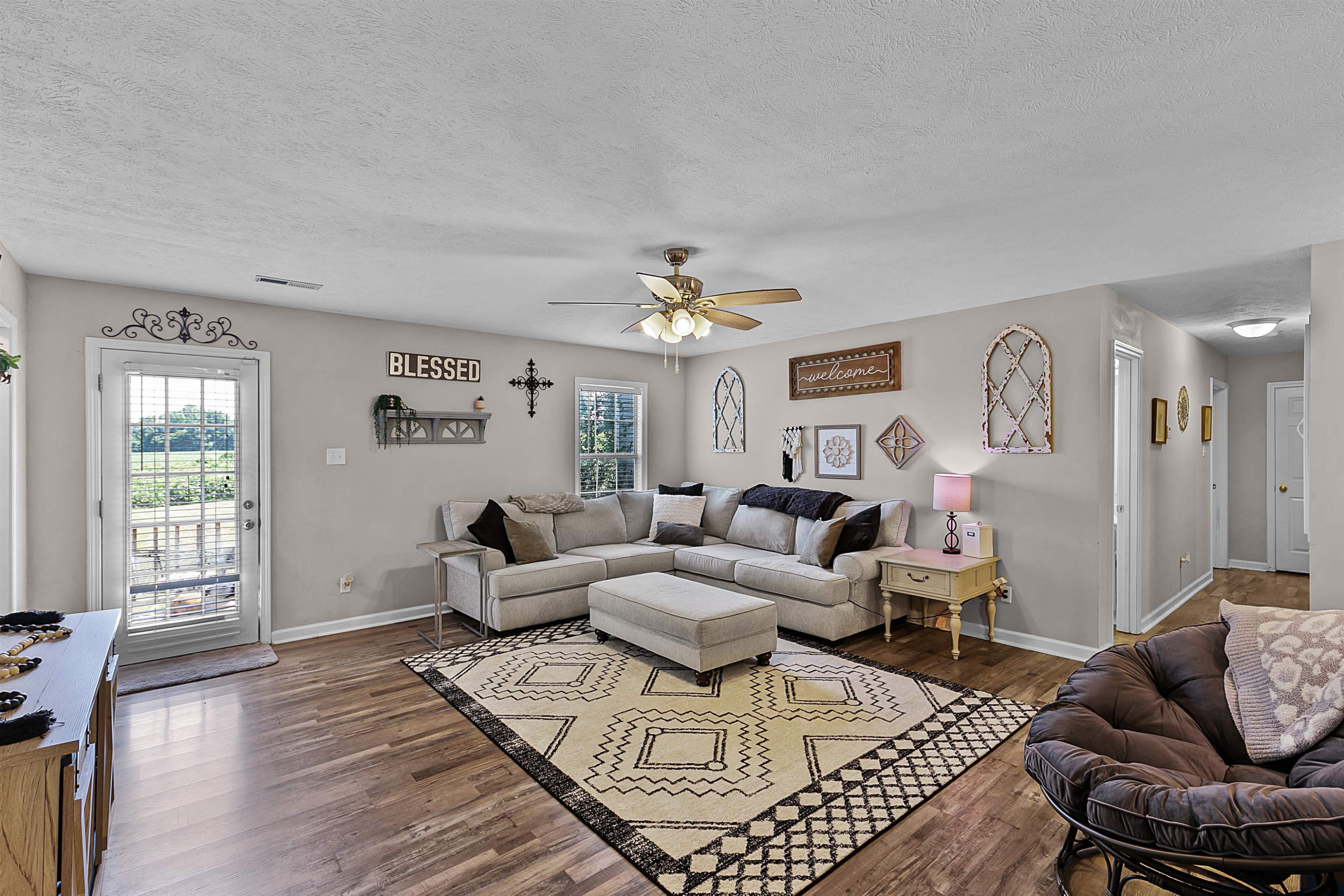 686 Gobelet Road Medon, TN 38356 - Photo 5 of 14 a living room with furniture a chandelier and a window