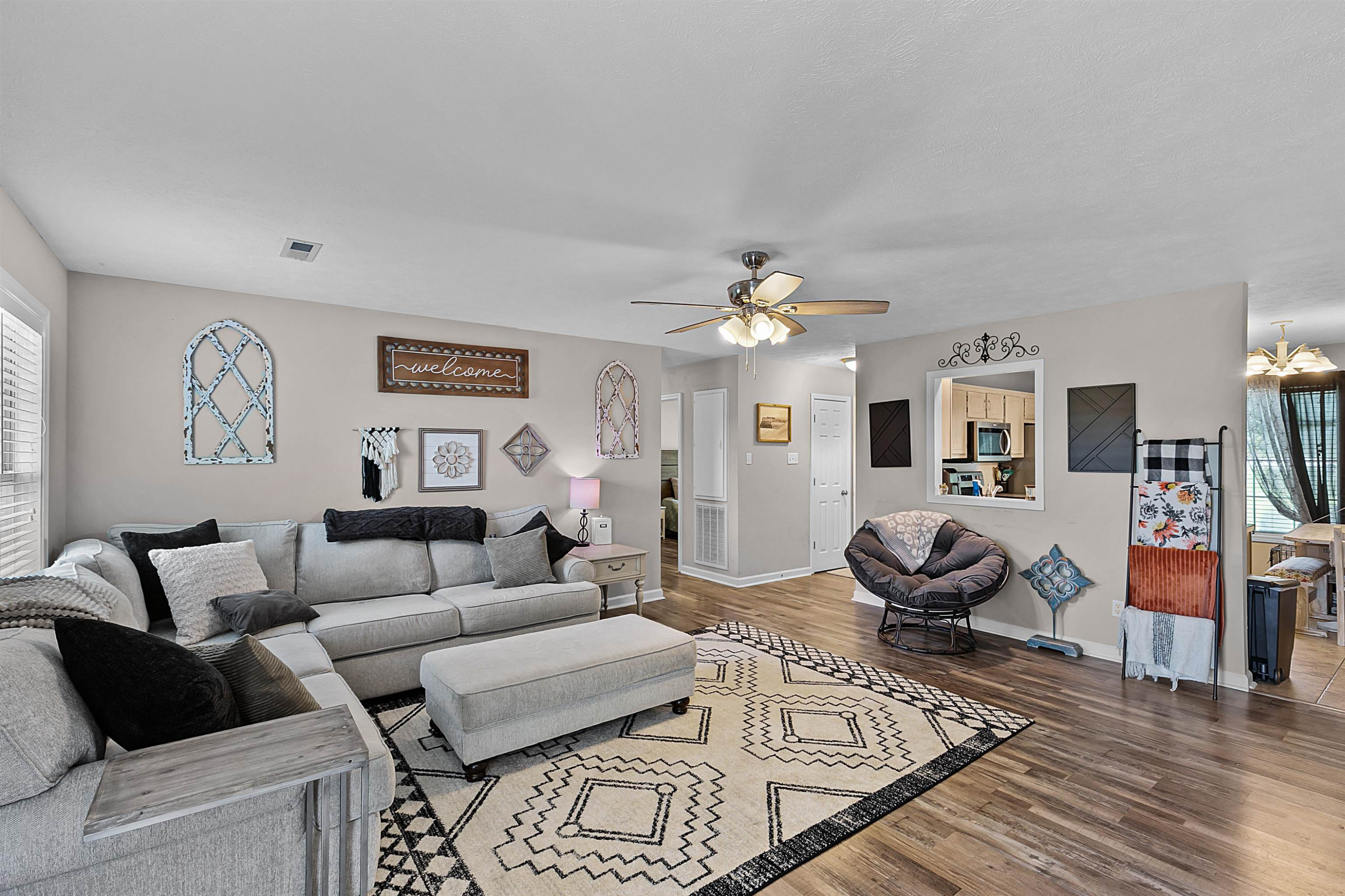 686 Gobelet Road Medon, TN 38356 - Photo 6 of 14 a living room with furniture or couch and a chandelier