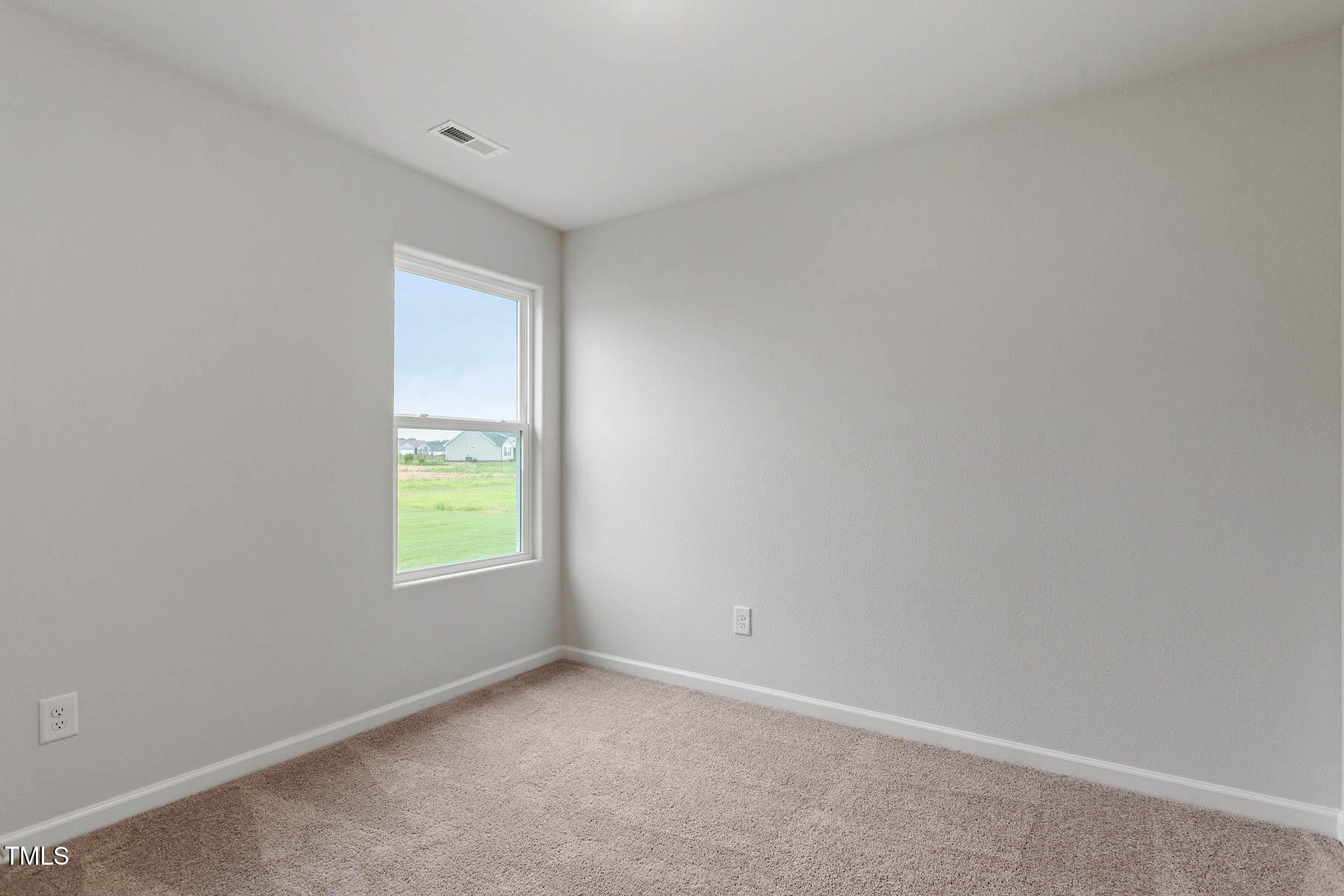 9080 Ava Drive Bailey, NC 27807 - Photo 17 of 20 an empty room with a window