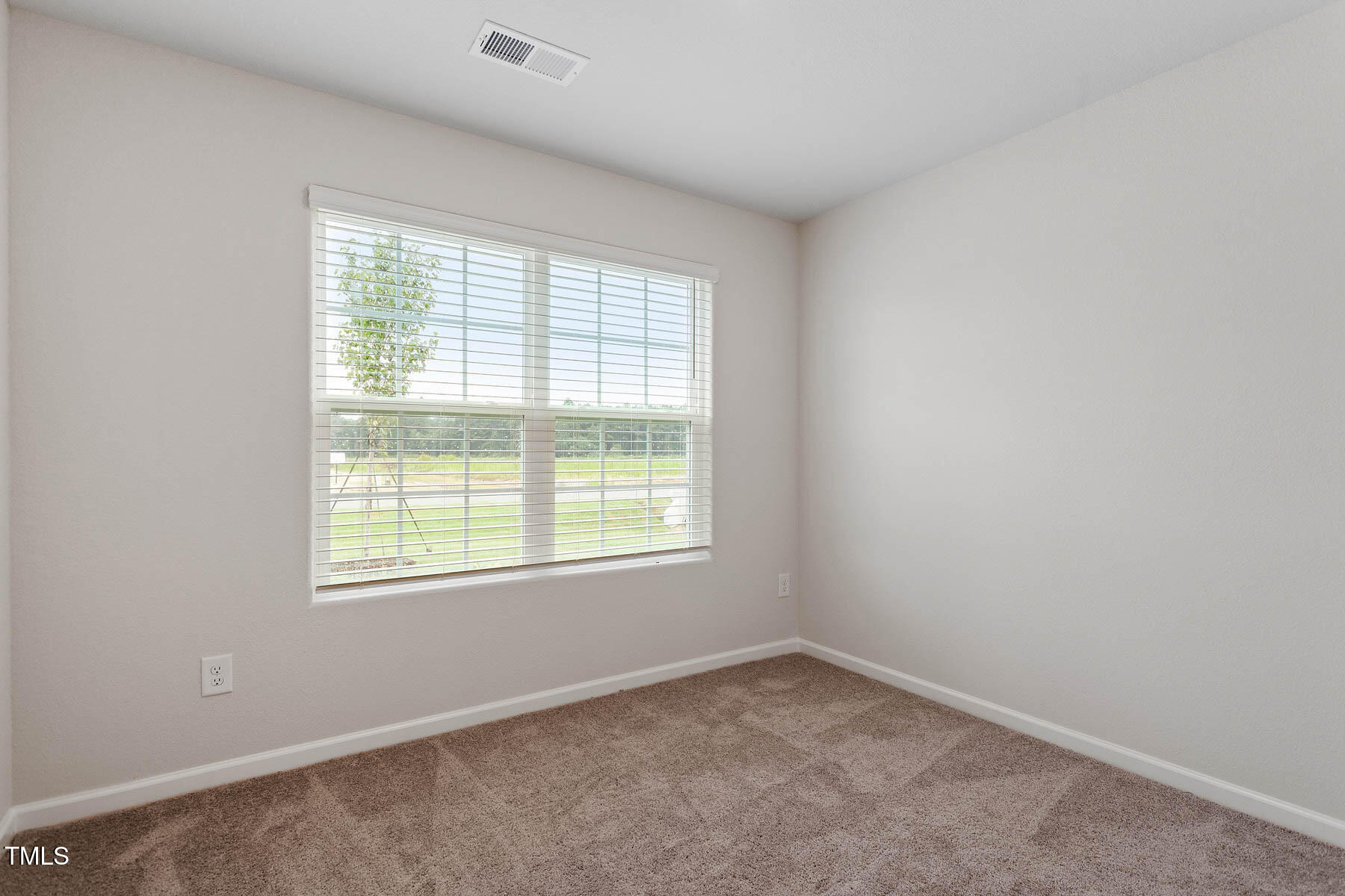 9080 Ava Drive Bailey, NC 27807 - Photo 18 of 20 an empty room with a window