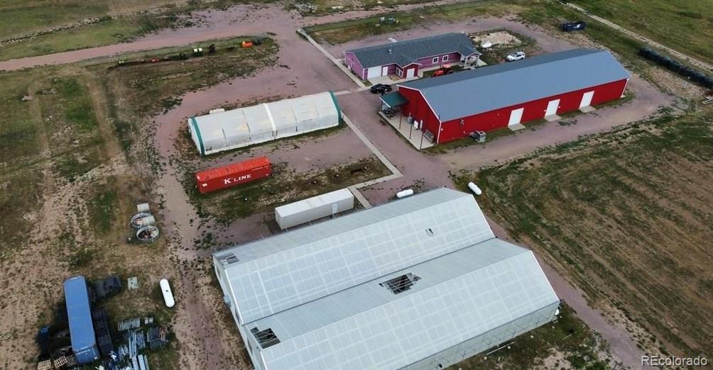 8648 Lake Davis Road Pueblo, CO 81005 - Photo 14 of 50 an aerial view of a house with a backyard