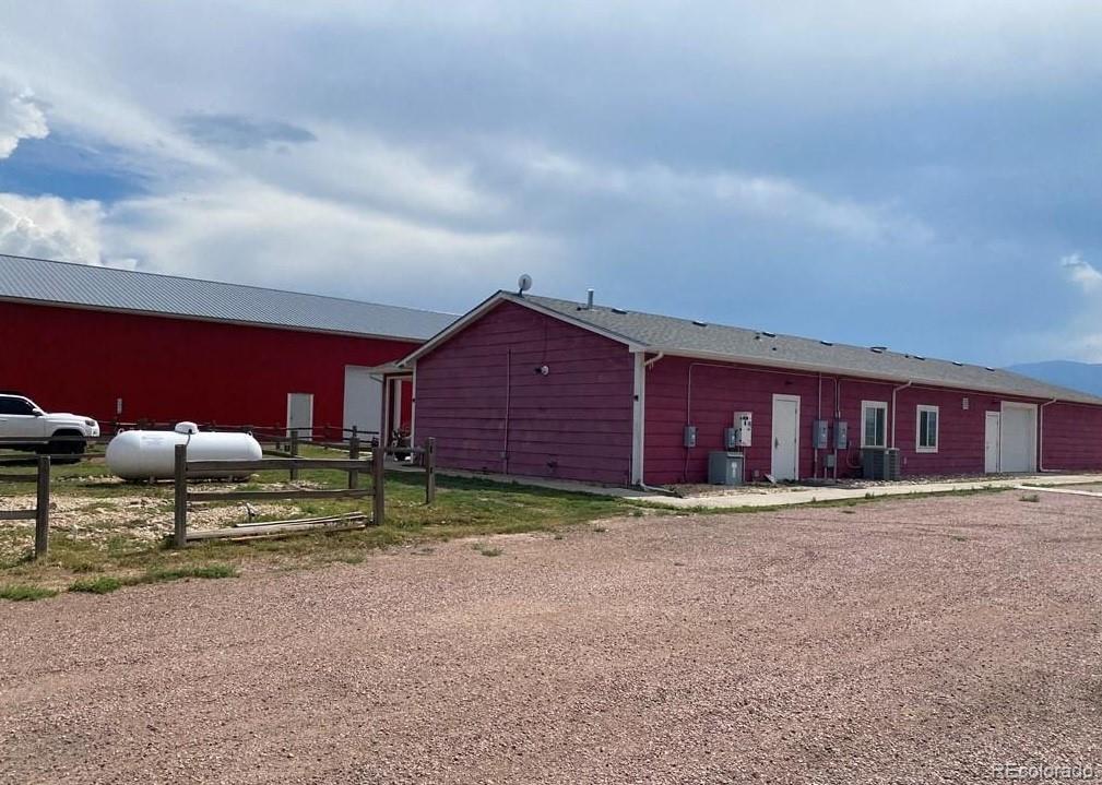 8648 Lake Davis Road Pueblo, CO 81005 - Photo 19 of 50 a house view with a backyard space
