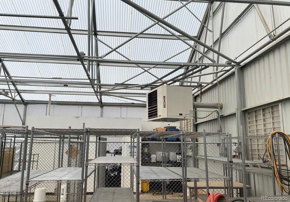 8648 Lake Davis Road Pueblo, CO 81005 - Photo 23 of 50 a view of entryway with a kitchen